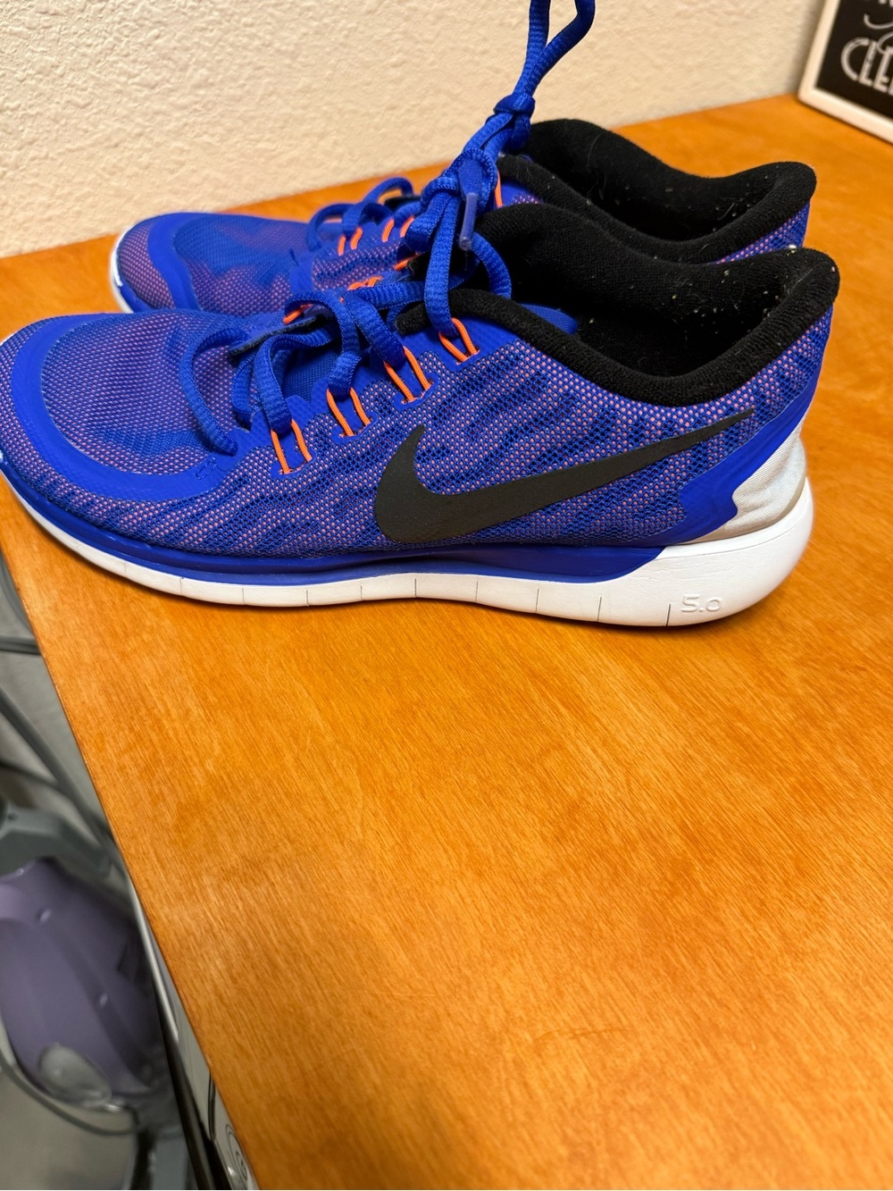 Nike Royal Blue and Black Athletic Sneakers with Orange Highlights
